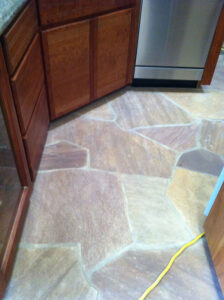 Flagstone floor cleaned and color-enhanced in Tucson, Arizona.