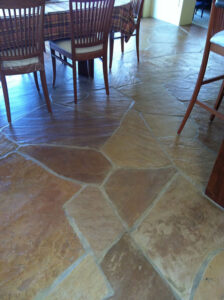 Natural stone tile floor polished in a Tucson home dining area.