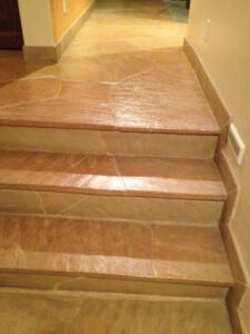 Terracotta tiles on stairs professionally cleaned and sealed in Tucson.