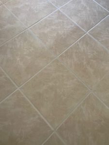 Tan ceramic tile floor cleaning and grout brightening in Tucson by Arizona Tile & Grout Care.