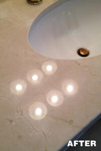 Bathtub surrounded by polished marble tiles—expert marble cleaning in Tucson, Arizona.