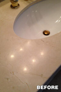 Bathtub surrounded by polished marble tiles—expert marble cleaning in Tucson, Arizona.