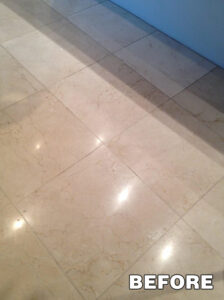 Polished marble tile floor reflecting light—tile polishing in Tucson by Arizona Tile & Grout Care.