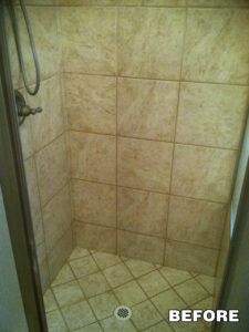 Shower corner with floor and wall tiles—professional bathroom tile restoration in Tucson, Arizona.